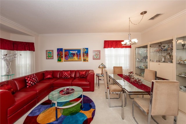 carpeted living room with a chandelier and ornamental molding