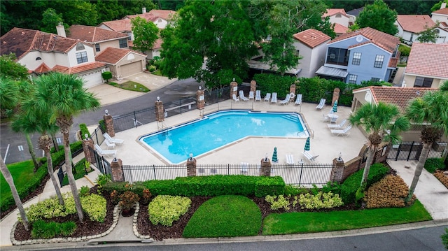 view of swimming pool featuring a patio area