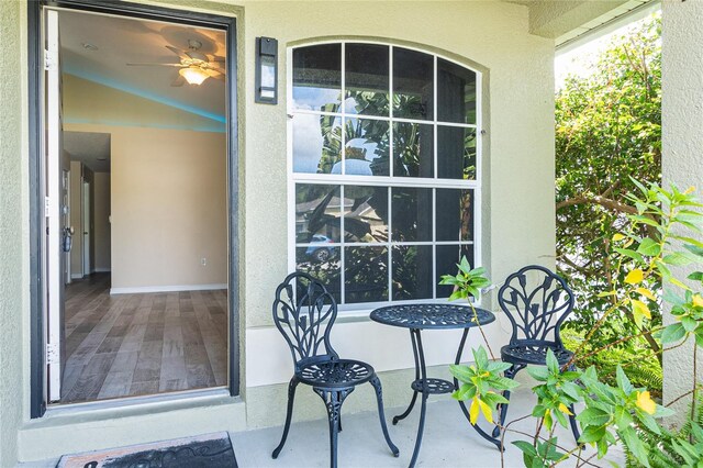 view of exterior entry with stucco siding