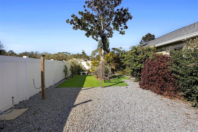 view of yard featuring a fenced backyard