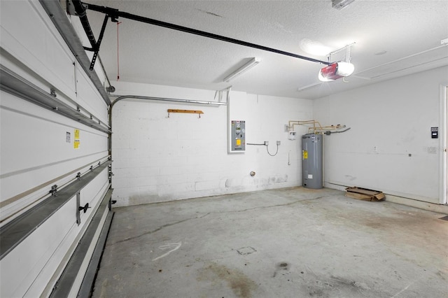 garage with a garage door opener, concrete block wall, electric water heater, and electric panel