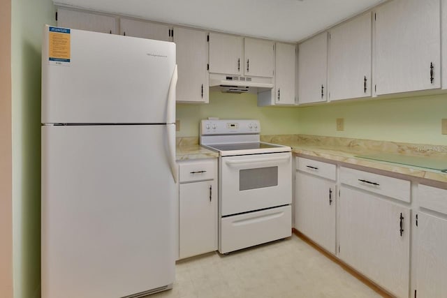 kitchen with wall chimney exhaust hood, light tile patterned flooring, and white appliances