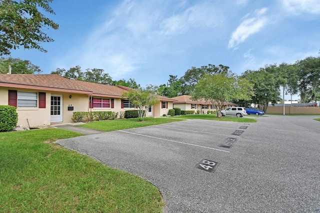 exterior space with a front lawn