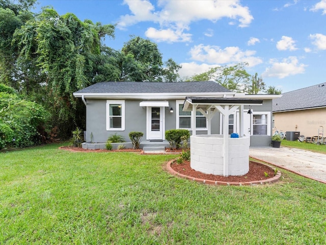 ranch-style house with a front yard