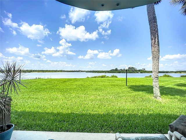 view of yard with a water view