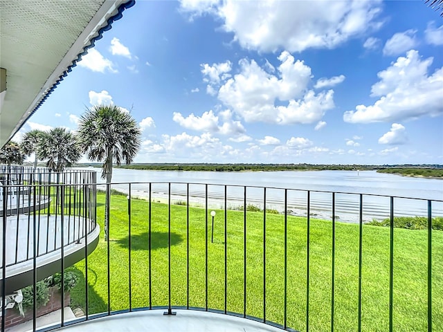 balcony featuring a water view