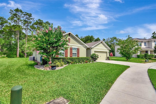 view of front facade with stucco siding, concrete driveway, an attached garage, central AC unit, and a front lawn