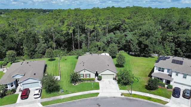 bird's eye view featuring a forest view