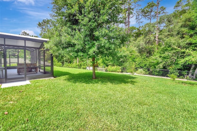 view of yard featuring fence