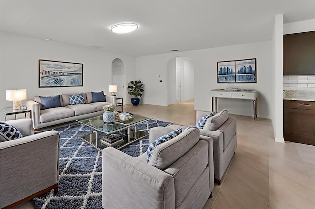 317 Nowell Loop, Deland, FL 32724 - living area with arched walkways