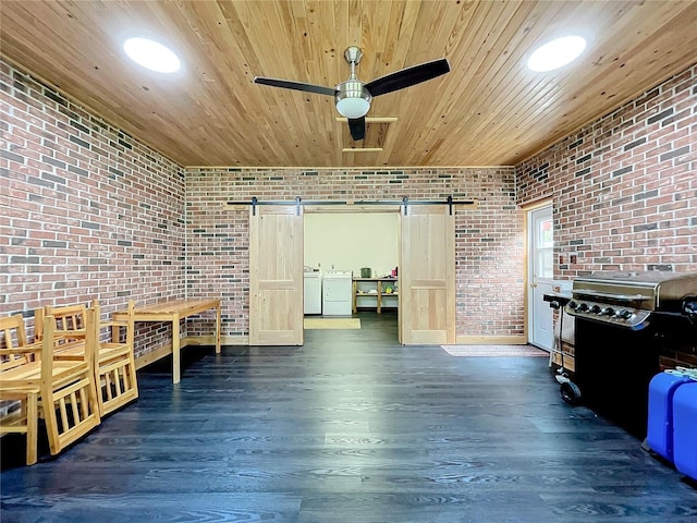 interior space with ceiling fan, wood ceiling, and washer / clothes dryer