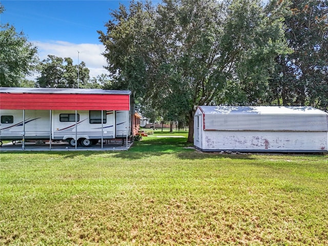 view of yard with a carport