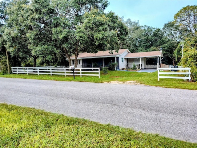 view of front of home with a front lawn