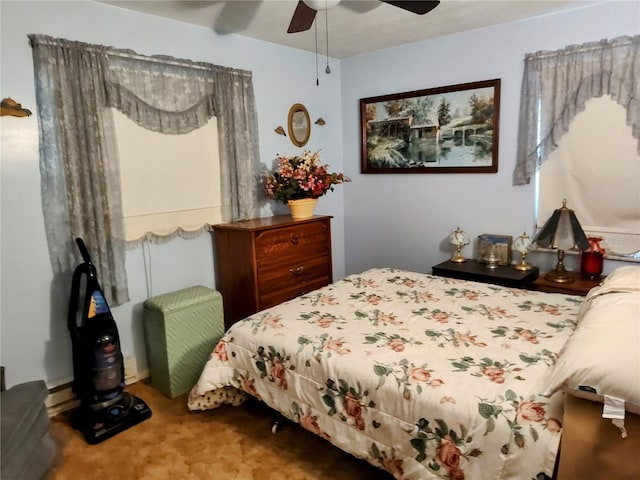 bedroom featuring carpet and ceiling fan