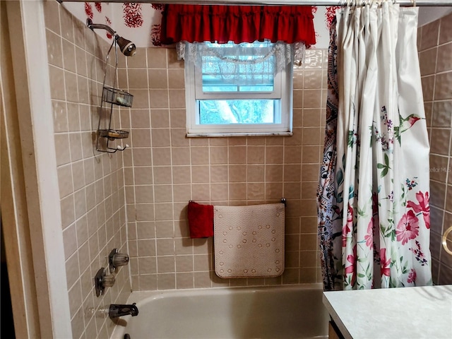 bathroom featuring vanity and shower / tub combo