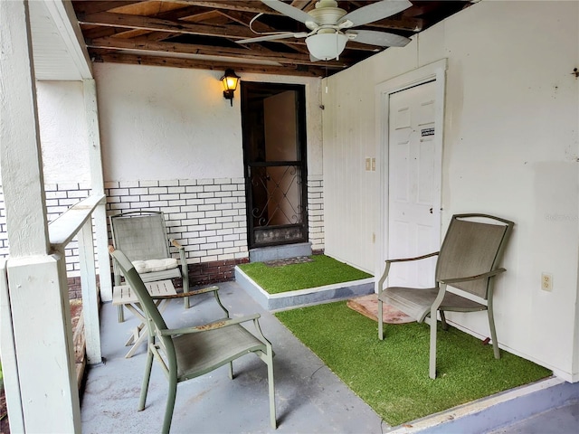 view of patio featuring ceiling fan