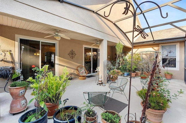 view of patio / terrace featuring ceiling fan