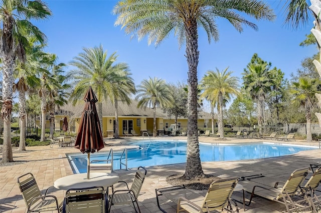 view of swimming pool featuring a patio