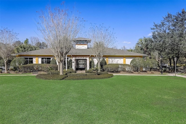 view of front of home with a front yard