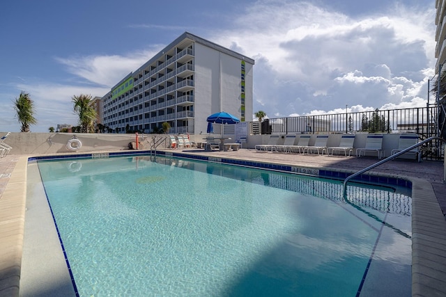 view of pool featuring a patio area