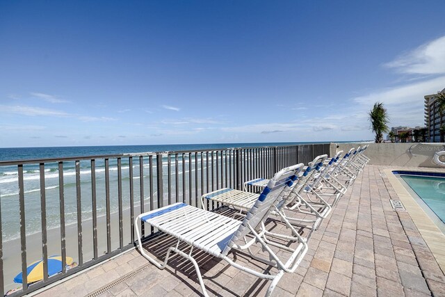 exterior space with a view of the beach and a water view