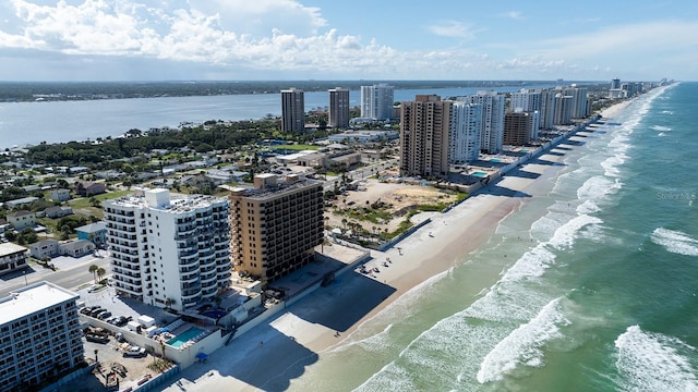 aerial view with a beach view and a water view