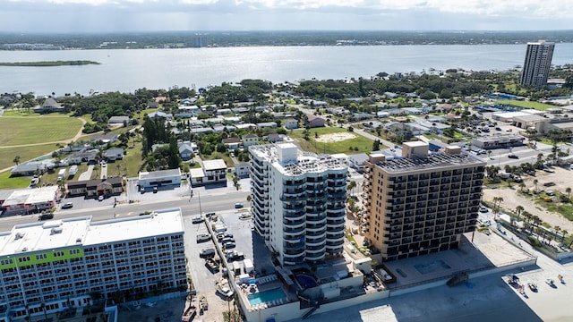 drone / aerial view with a water view