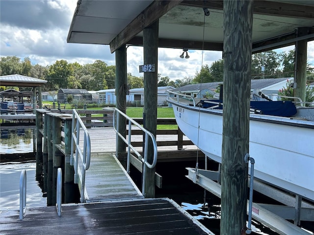 dock area featuring a water view