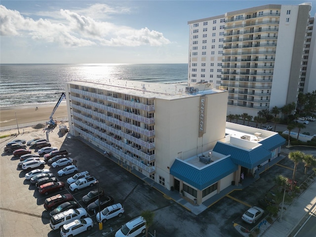 aerial view featuring a beach view and a water view