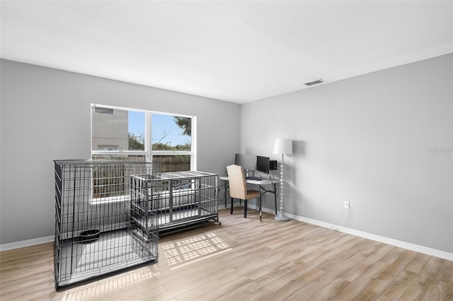 bedroom featuring light hardwood / wood-style floors