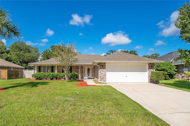 single story home featuring a garage and a front yard