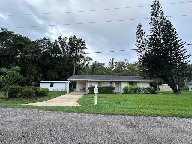 ranch-style house with a front yard