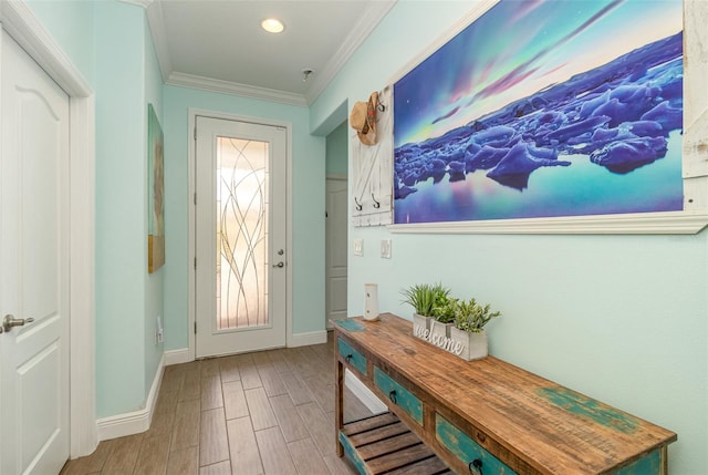 entrance foyer with light wood-type flooring and ornamental molding