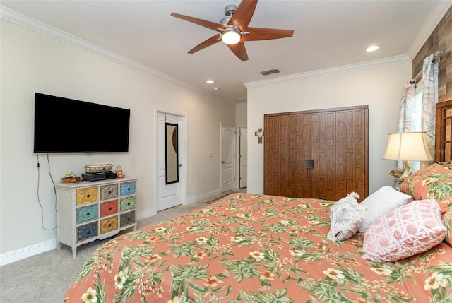 bedroom featuring ceiling fan, light colored carpet, and crown molding