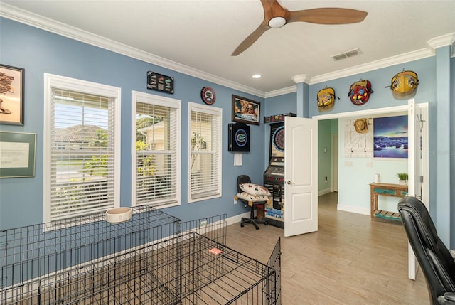 office area featuring ornamental molding, ceiling fan, and hardwood / wood-style floors