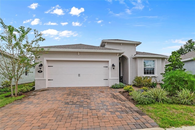 view of front of property featuring a garage