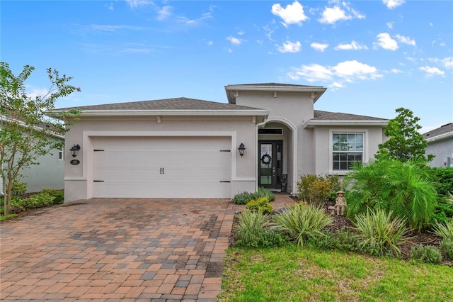 view of front of home with a garage