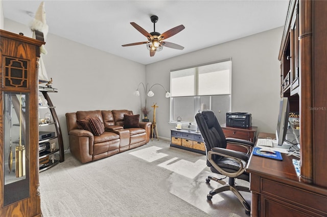 office space featuring carpet flooring and ceiling fan