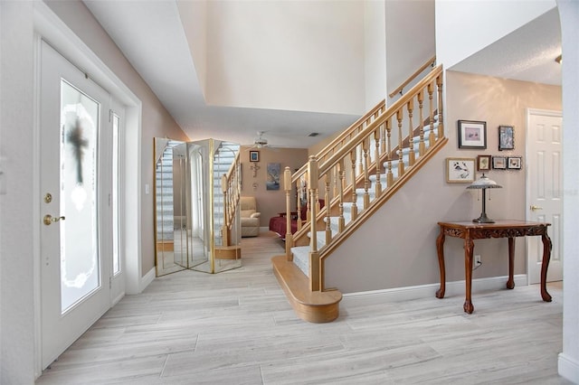 foyer with light hardwood / wood-style floors