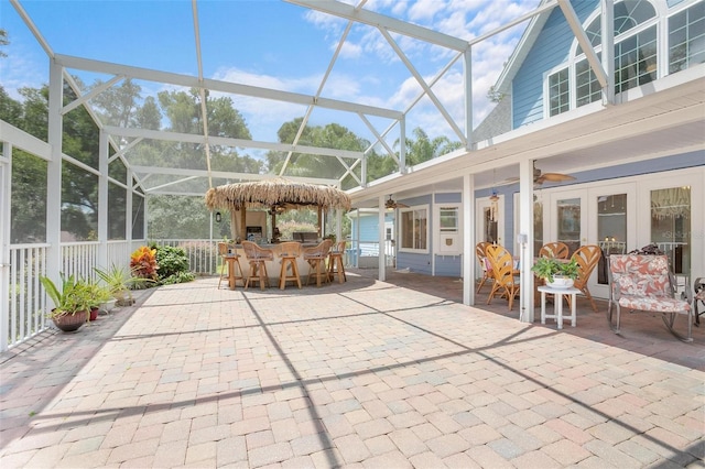 unfurnished sunroom featuring lofted ceiling