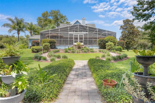 view of property's community featuring a lawn