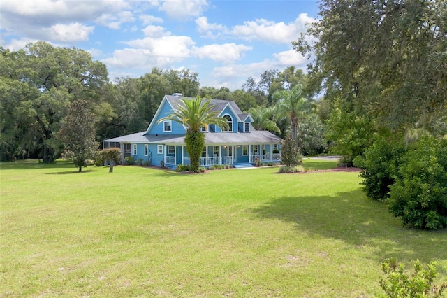 exterior space with a porch and a lawn