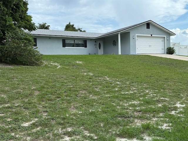 ranch-style home featuring stucco siding, driveway, fence, a front yard, and a garage