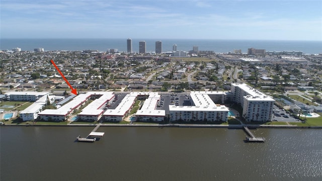 birds eye view of property featuring a water view