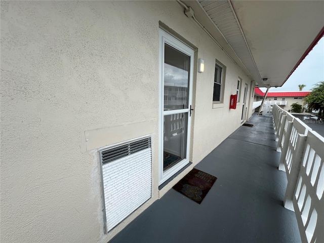 view of patio featuring a balcony