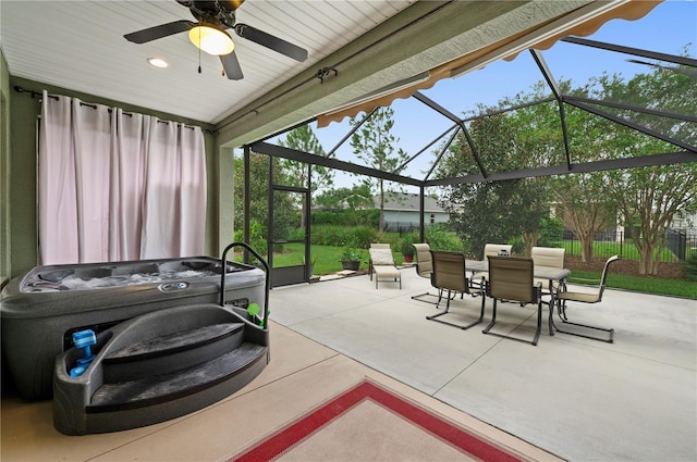 view of patio / terrace with a lanai and ceiling fan