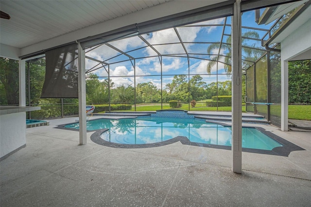 view of pool featuring a lanai and a patio