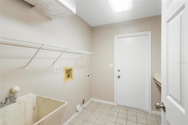 clothes washing area featuring washer hookup, light tile patterned flooring, sink, and hookup for an electric dryer