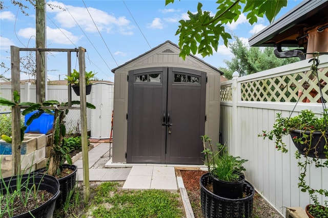 980 Bluebird Ter, Deltona, FL 32725 - view of shed with a fenced backyard