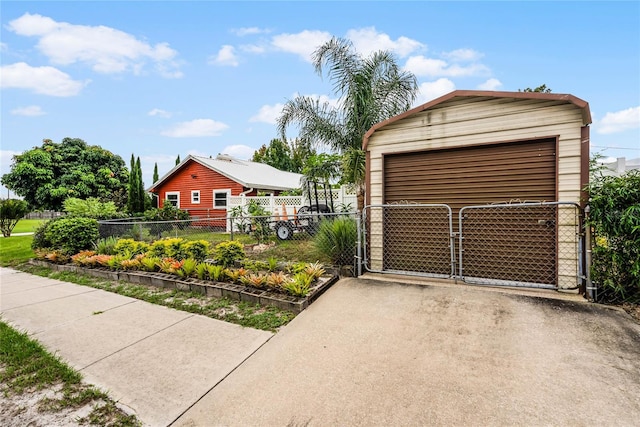 980 Bluebird Ter, Deltona, FL 32725 - detached garage with a gate and fence